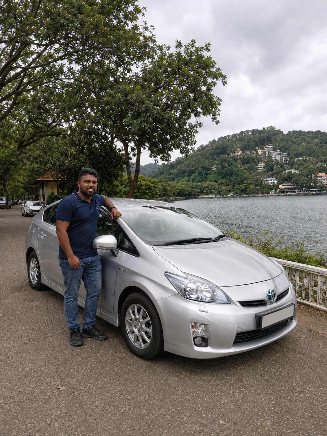 Paradise Kandy Taxi driver and the car by Kandy lake